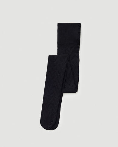 113067001 ina pointelle tights black swedish tights flatlay