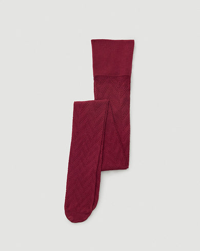 113067510 ina pointelle tights red mahogany swedish stockings flatlay