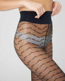 113073001-mila-ruffle-tights-black-swedish-stockings-3