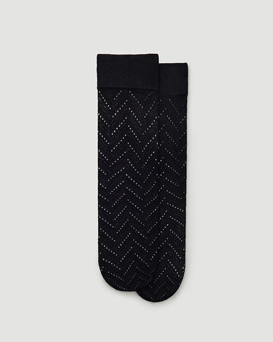 163011001 ina pointelle knee highs black swedish stockings flatlay_b9cf6c67 019d 41c3 93de 378f68476586